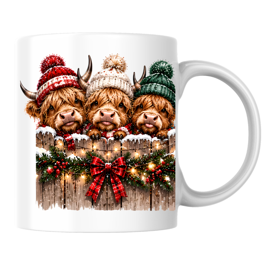 Highland Cows Christmas Fence Mug "Merry & Bright" Festive Highland Cows 325ml Ceramic Coffee Mug – Three Cute Cows in Winter Bobble Hats Behind Snowy Fence with Fairy Lights & Red Tartan Bow | Christmas Gift | Fast Dispatch by UK Seller (M3429)