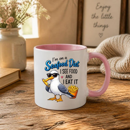 Humorous Mug "I'm On A Seafood Diet I See Food And I Eat It" Funny Seagull 325ml Ceramic Coffee Mug Sassy Beach Bird Tea Cup with Sunglasses, Chips & Ice Lolly Graphic Gift | Available in Multicolours | Fast Dispatch by UK Seller (M1311)