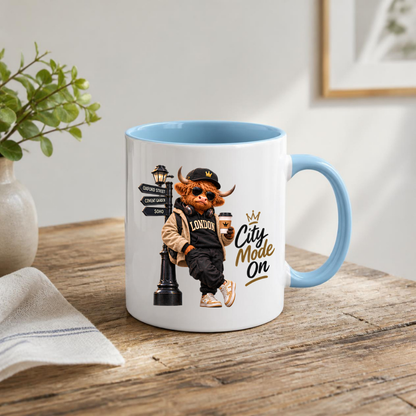London Mug "City Mode On Cool Highland Cow" City Mode On 325ml Ceramic Coffee Mug – Cool Highland Cow in Cap, Sunglasses & Jacket Leaning on London Street Sign City Gift | Available in Multicolours | Fast Dispatch by UK Seller (M3284)