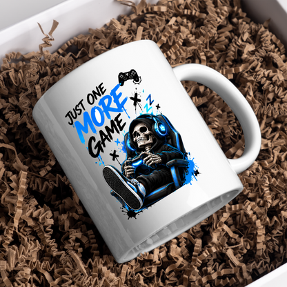Gaming Mug "Just One More Game" Just One More Game 325ml Ceramic Coffee Mug – Gaming Skeleton in Chair Mug with Controller, Headset & Blue Splatter Art | Gamer Gift | Fast Dispatch by UK Seller (M3344)
