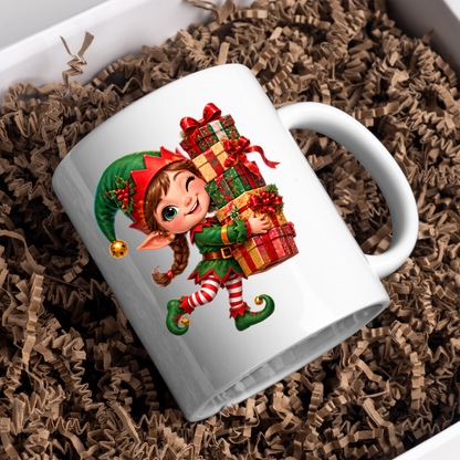 Christmas Mug "Winking Christmas Elf Stacked Presents" Winking Christmas Elf 325ml Ceramic Coffee Mug – Cute Festive Tea Cup with Elf Outfit Jingle Bells Wrapped Gift Stack Graphic Gift | Available in Multicolours | Fast Dispatch by UK Seller (M3183)