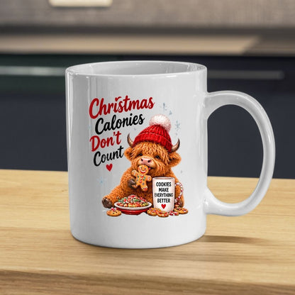 Festive Mug "Christmas Calories Don't Count" Highland Cow 325ml Ceramic Coffee Mug Cute Holiday Tea Cup with Gingerbread Man, Beanie & Cookies Gift | Available in Multicolours | Fast Dispatch by UK Seller (M1296)