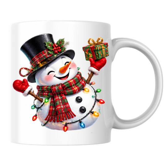 Christmas Mug "Cheerful Snowman Plaid Scarf Gift" Cheerful Snowman 325ml Ceramic Coffee Mug – Festive Christmas Tea Cup with Plaid Scarf, Top Hat Christmas Lights Gift Graphic Gift | Available in Multicolours | Fast Dispatch by UK Seller (M3184)