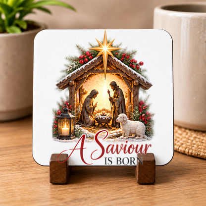 Christmas Nativity Hardboard Coaster "A Saviour Is Born" Graphic 9cm x 9cm Square Drinks Coaster “Holy Family Manger Scene with Lamb, Star of Bethlehem & Lantern Novelty Mat | Christian Glossy Gift | Fast Dispatch by UK Seller (C3048)