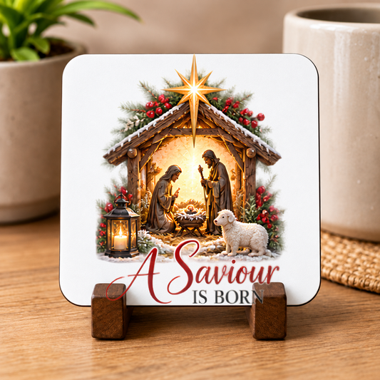 Christmas Nativity Hardboard Coaster "A Saviour Is Born" Graphic 9cm x 9cm Square Drinks Coaster “Holy Family Manger Scene with Lamb, Star of Bethlehem & Lantern Novelty Mat | Christian Glossy Gift | Fast Dispatch by UK Seller (C3048)
