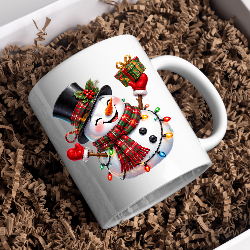 Christmas Mug "Cheerful Snowman Plaid Scarf Gift" Cheerful Snowman 325ml Ceramic Coffee Mug – Festive Christmas Tea Cup with Plaid Scarf, Top Hat Christmas Lights Gift Graphic Gift | Available in Multicolours | Fast Dispatch by UK Seller (M3184)