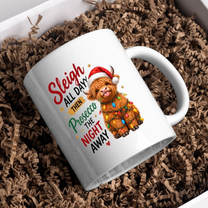 Festive Mug "Sleigh All Day Then Prosecco The Night Away" Highland Cow 325ml Ceramic Coffee Mug Cute Christmas Fairy Lights Tea Cup with Santa Hat & Stars Gift | Available in Multicolours | Fast Dispatch by UK Seller (M1291)