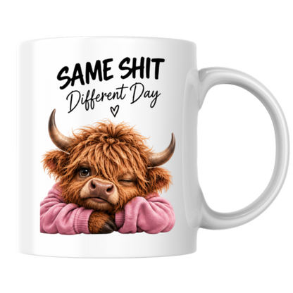 Sassy Highland Cow Mug "SAME SHIT Different Day" Graphic 325ml Ceramic Coffee Cup Highland Cow in Pink Jumper Winking Novelty Tea Cup | Funny Sarcastic Work Gift for Coworkers & Friends | Available in Multicolours | Fast Dispatch by UK Seller (M3137)