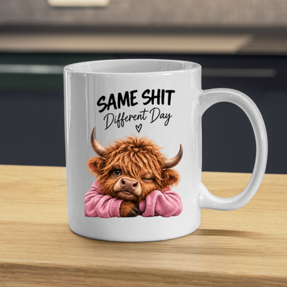 Sassy Highland Cow Mug "SAME SHIT Different Day" Graphic 325ml Ceramic Coffee Cup Highland Cow in Pink Jumper Winking Novelty Tea Cup | Funny Sarcastic Work Gift for Coworkers & Friends | Available in Multicolours | Fast Dispatch by UK Seller (M3137)