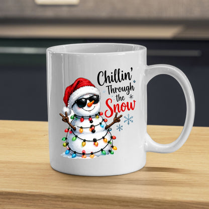 Cool Mug "Chillin' Through the Snow" Snowman 325ml Ceramic Coffee Mug  Funny Winter Holiday Tea Cup with Sunglasses & Christmas Lights Gift | Available in Multicolours | Fast Dispatch by UK Seller (M1248)