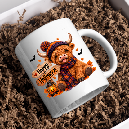 Halloween Mug "Cozy Beanie Happy Halloween" Cozy Halloween Highland Cow 325ml Ceramic Coffee Mug – Autumn Beanie Tea Cup with Wooden Sign Lantern Graphic Gift | Available in Multicolours | Fast Dispatch by UK Seller (M3167)