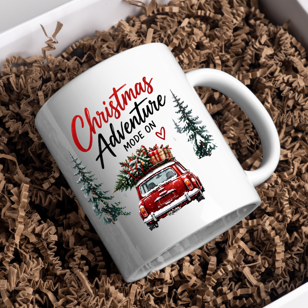Festive Red Car Christmas Mug "Christmas Adventure Mode On" Christmas Adventure Mode On 325ml Ceramic Coffee Mug – Vintage Red Car with Christmas Tree & Gift Boxes with Snowy Pine Trees | Festive Holiday Gift | Fast Dispatch by UK Seller (M3398)
