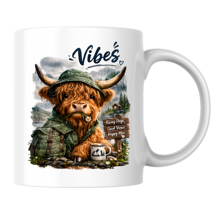 Cozy Mug "Vibes - Rainy Days, Good Views, Happy Moo" Hiking Highland Cow 325ml Ceramic Coffee Mug Whimsical Outdoor Tea Cup with Rain Hat and Mountain Scene Graphic Gift | Available in Multicolours | Fast Dispatch by UK Seller (M3156)
