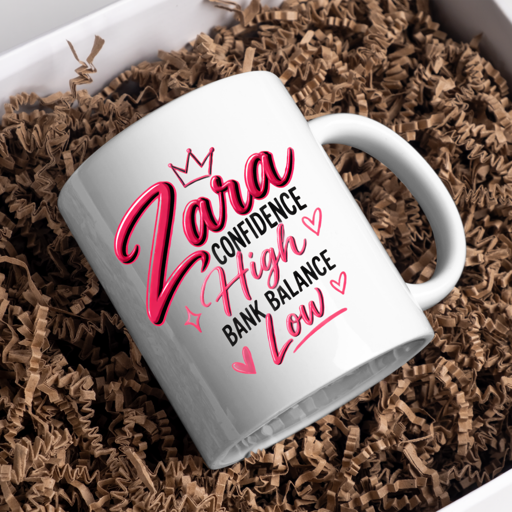 Personalized Name Mug "Zara Confidence High Bank Balance Low" Zara Confidence High Bank Balance Low 325ml Ceramic Coffee Mug – Custom Name Typography Slogan with Pink Tiara Crown, Hearts & Sparkles | Funny Gift | Fast Dispatch by UK Seller (M3445)
