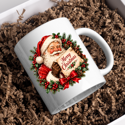 Vintage Santa Scroll Christmas Mug "Merry Christmas" Vintage Santa Claus Holding Merry Christmas Scroll 325ml Ceramic Coffee Mug – Jolly Father Christmas with Festive Wreath, Red Bow & Pine Branches | Holiday Gift | Fast Dispatch by UK Seller (M3440)