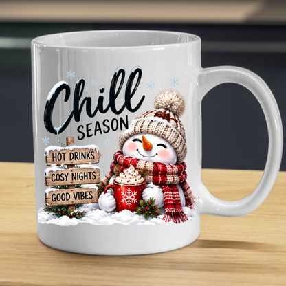 Snowman Chill Season Mug "Chill Season Hot Drinks Cosy Nights Good Vibes" Chill Season Hot Drinks 325ml Ceramic Coffee Mug – Cute Snowman in Beanie & Scarf holding Hot Chocolate Mug with Wooden Sign Post | Winter Gift | Fast Dispatch by UK Seller (M3400)