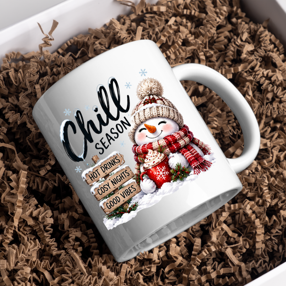 Snowman Chill Season Mug "Chill Season Hot Drinks Cosy Nights Good Vibes" Chill Season Hot Drinks 325ml Ceramic Coffee Mug – Cute Snowman in Beanie & Scarf holding Hot Chocolate Mug with Wooden Sign Post | Winter Gift | Fast Dispatch by UK Seller (M3400)