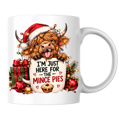 Highland Cow Christmas Mince Pies Mug "I'm Just Here For The Mince Pies" I'm Just Here For The Mince Pies 325ml Ceramic Coffee Mug – Cute Highland Cow in Hat with Fairy Lights & Mince Pie Graphic | Festive Holiday Gift | Fast Dispatch by UK Seller (M3412)