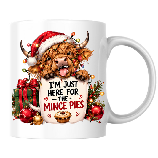 Highland Cow Christmas Mince Pies Mug "I'm Just Here For The Mince Pies" I'm Just Here For The Mince Pies 325ml Ceramic Coffee Mug – Cute Highland Cow in Hat with Fairy Lights & Mince Pie Graphic | Festive Holiday Gift | Fast Dispatch by UK Seller (M3412)