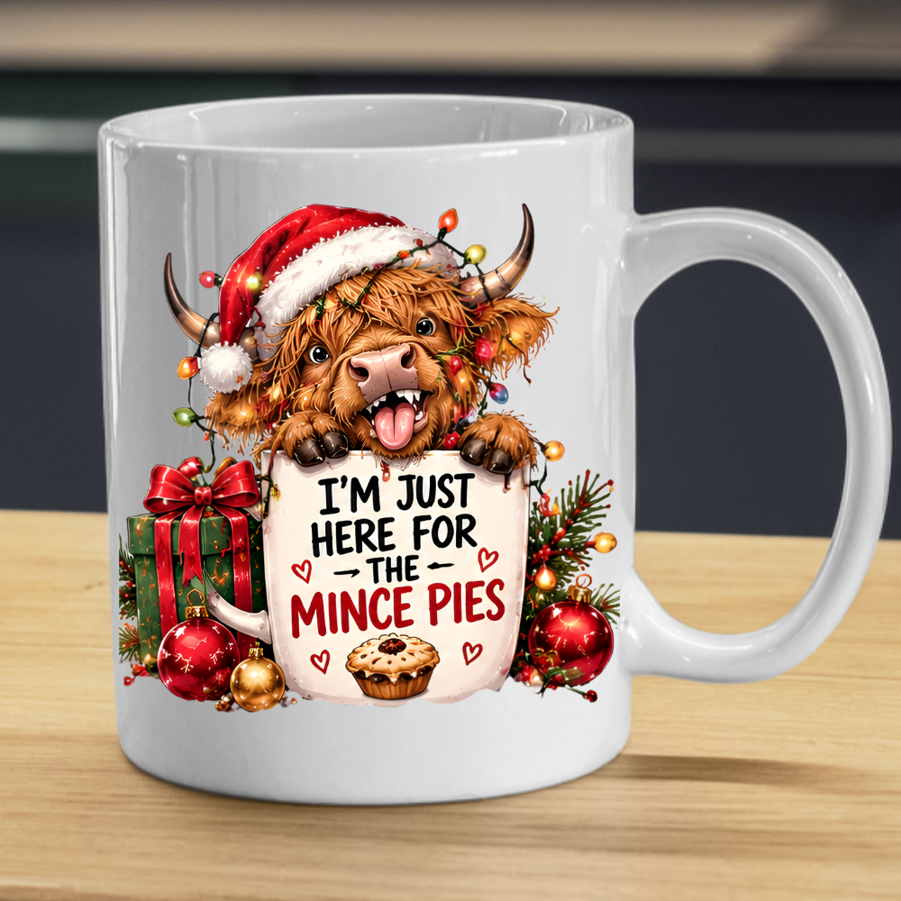 Highland Cow Christmas Mince Pies Mug "I'm Just Here For The Mince Pies" I'm Just Here For The Mince Pies 325ml Ceramic Coffee Mug – Cute Highland Cow in Hat with Fairy Lights & Mince Pie Graphic | Festive Holiday Gift | Fast Dispatch by UK Seller (M3412)