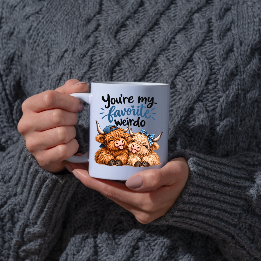 Funny Highland Cow Mug "You're My Favorite Weirdo" You're My Favorite Weirdo 325ml Ceramic Coffee Mug – Cute Couple Highland Cows with Blue Baseball Cap & Polka Dot Bow | Romantic & Funny Gift | Fast Dispatch by UK Seller (M3454)