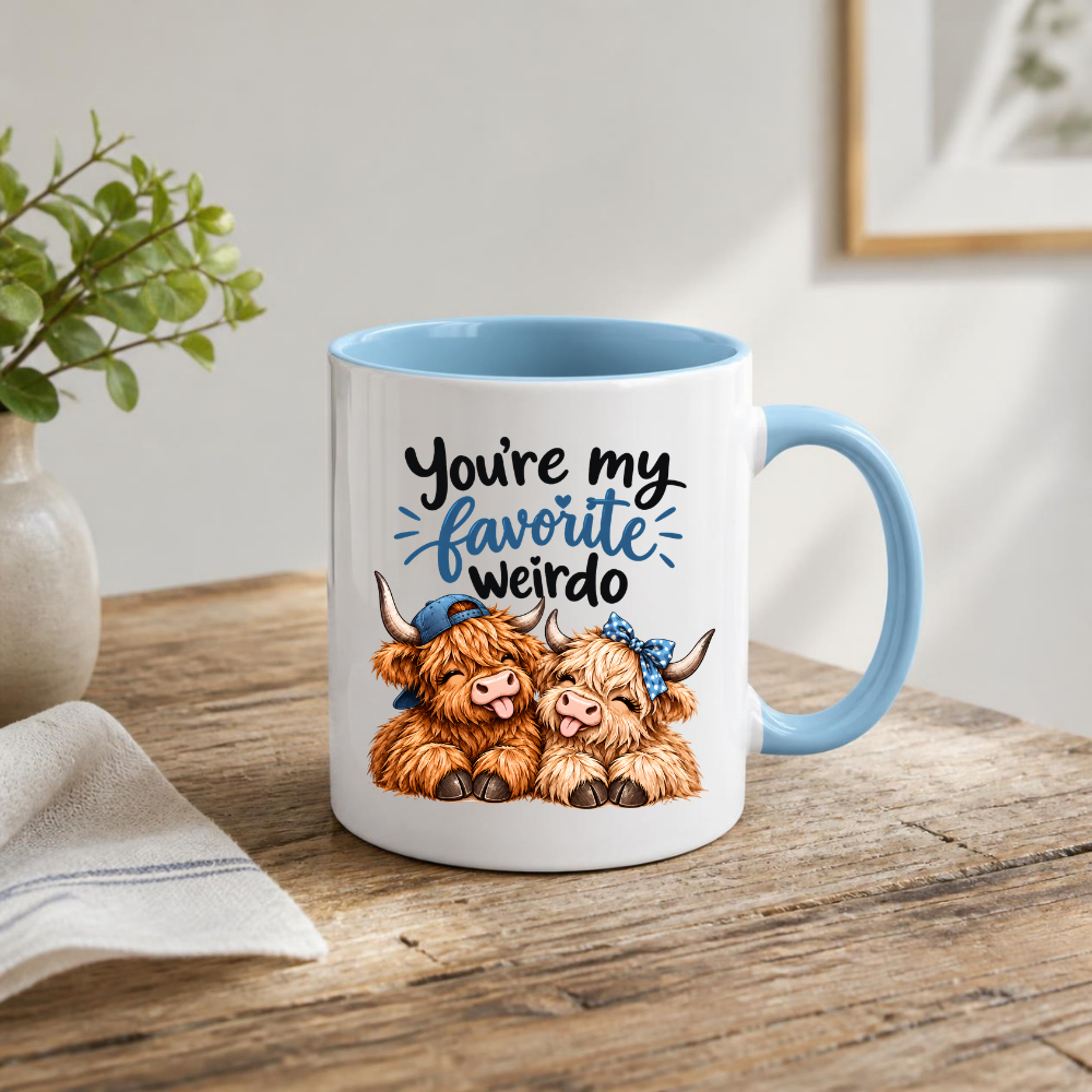 Funny Highland Cow Mug "You're My Favorite Weirdo" You're My Favorite Weirdo 325ml Ceramic Coffee Mug – Cute Couple Highland Cows with Blue Baseball Cap & Polka Dot Bow | Romantic & Funny Gift | Fast Dispatch by UK Seller (M3454)