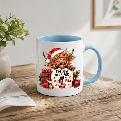 Highland Cow Christmas Mince Pies Mug "I'm Just Here For The Mince Pies" I'm Just Here For The Mince Pies 325ml Ceramic Coffee Mug – Cute Highland Cow in Hat with Fairy Lights & Mince Pie Graphic | Festive Holiday Gift | Fast Dispatch by UK Seller (M3412)