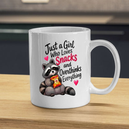Humorous Mug "Just A Girl Who Loves Snacks And Overthinks Everything" Cute Raccoon 325ml Ceramic Coffee Mug Funny Overthinker Tea Cup with Crisps Bag & Pink Hearts Graphic Gift | Available in Multicolours | Fast Dispatch by UK Seller (M1317)