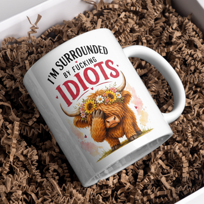 Funny Facepalm Highland Cow "I'm Surrounded by Fucking Idiots" Coffee Mug - Sarcastic Farm Animal Ceramic Tea Cup with Sunflower Crown & Relatable Meme Quote Gift (M1210)