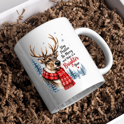 Uplifting Mug "Stay Positive Be Merry and Make it a Brighter Year" Reindeer 325ml Ceramic Coffee Mug Cozy Winter Holiday Tea Cup with Red Snowflake Scarf & Pine Forest Gift | Available in Multicolours | Fast Dispatch by UK Seller (M1259)
